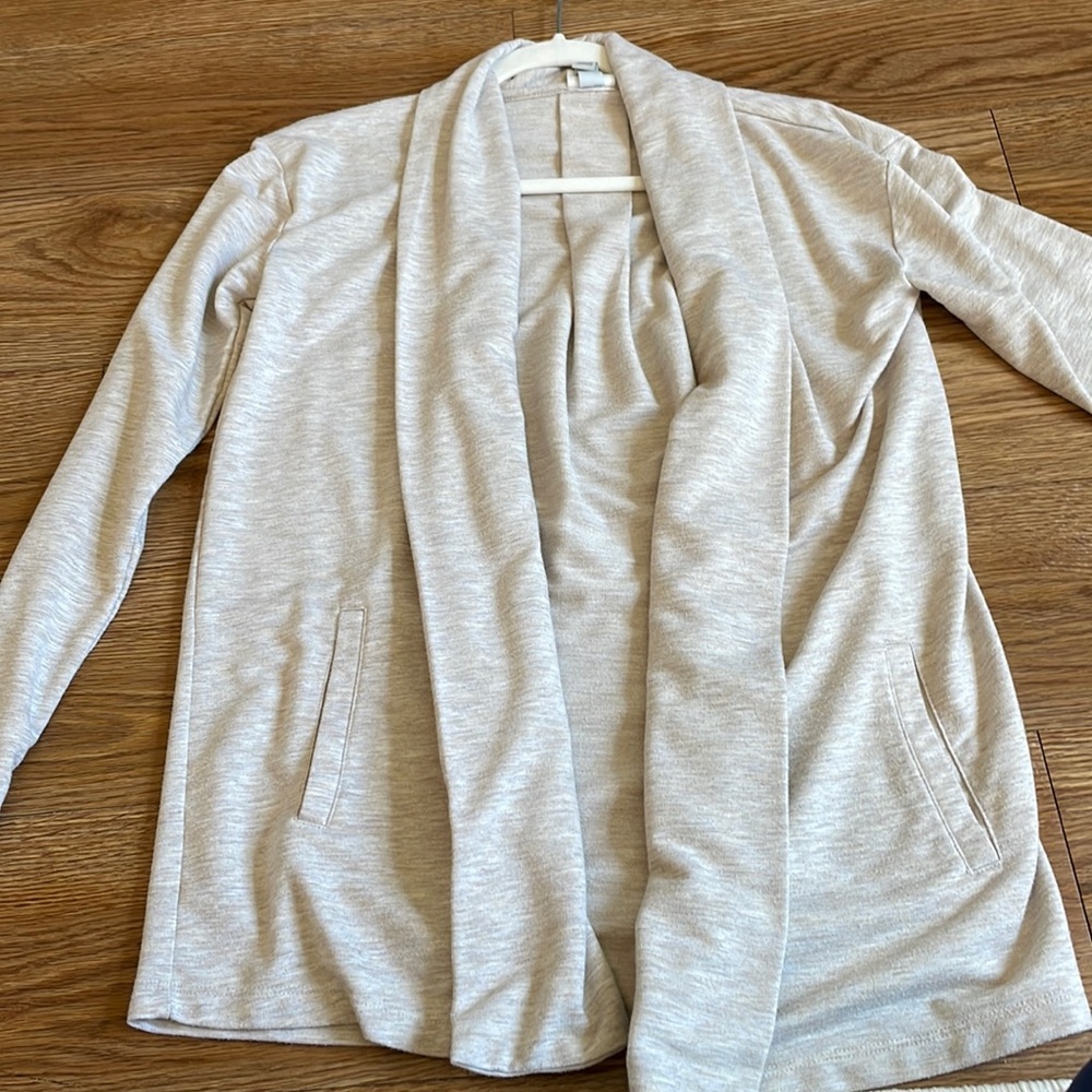 Cream cardigan perfect for the office.